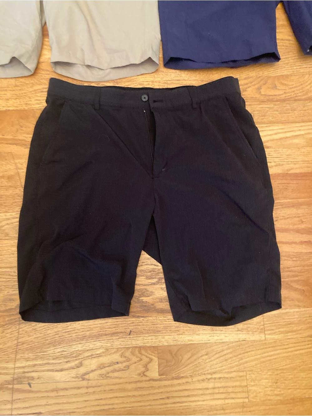 Under Armour and Greg Norman Men's Flat-Front Shorts Trio - Tan, Navy, Black - Picture 3 of 8